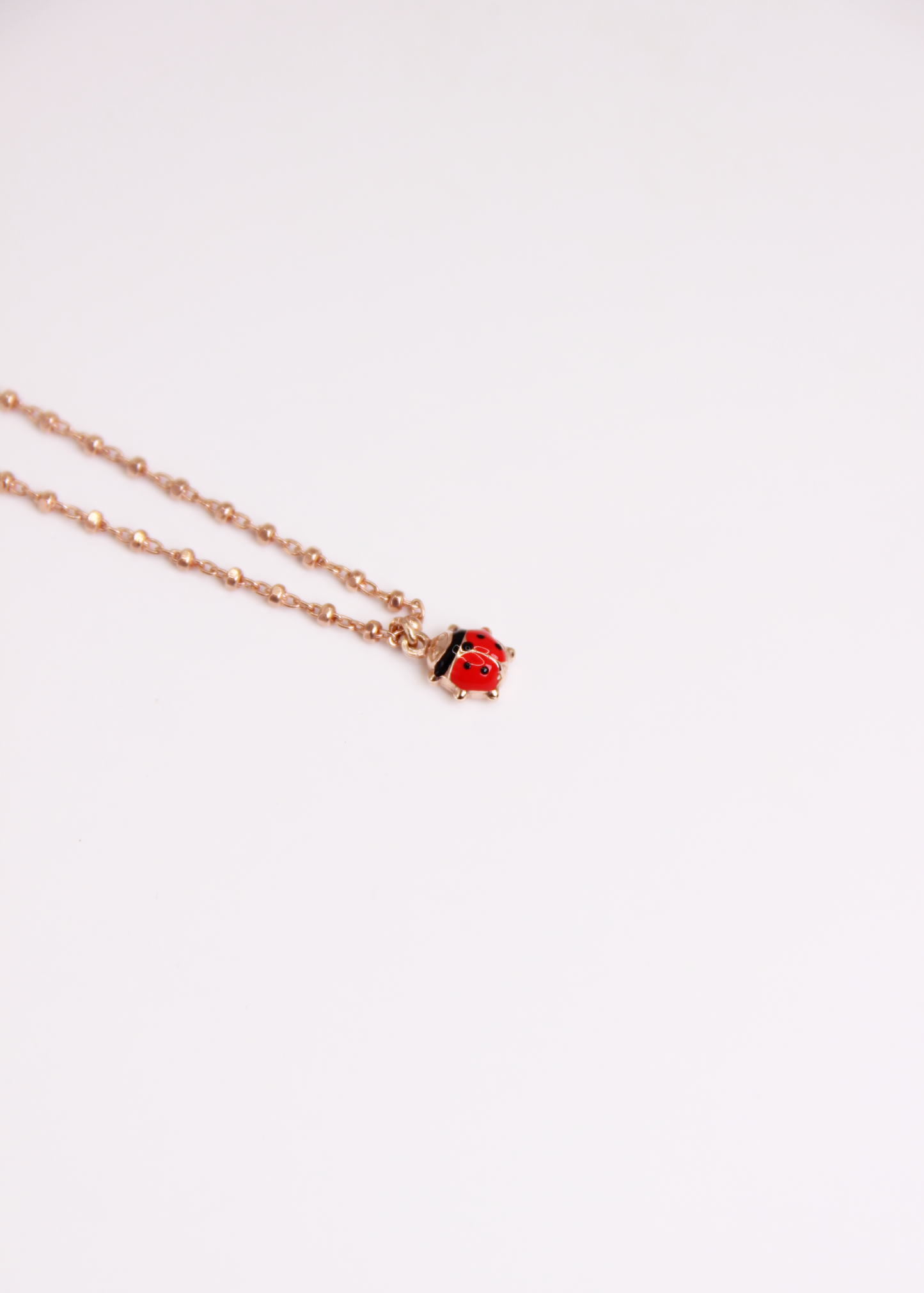 Bracciale con mini ciondolo in argento