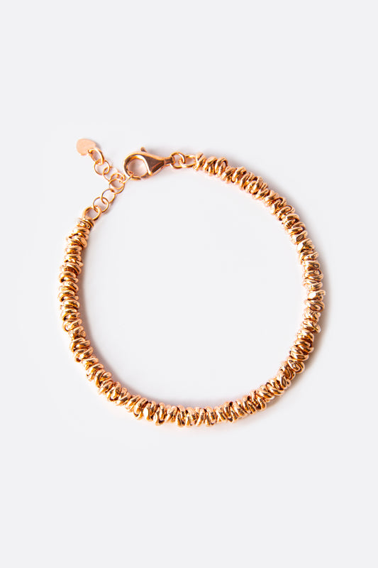 Bracciale argento rosè anellini intrecciati