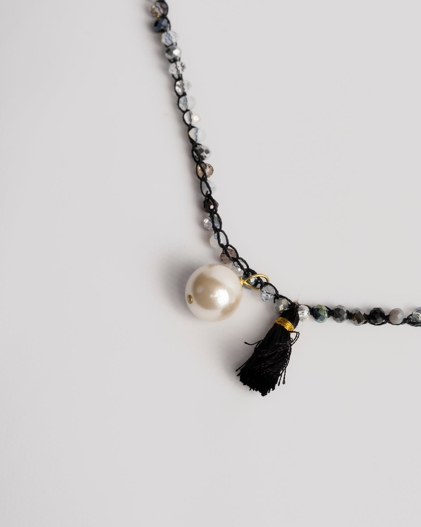 Collana uncinetto e cristalli con perla e nappina