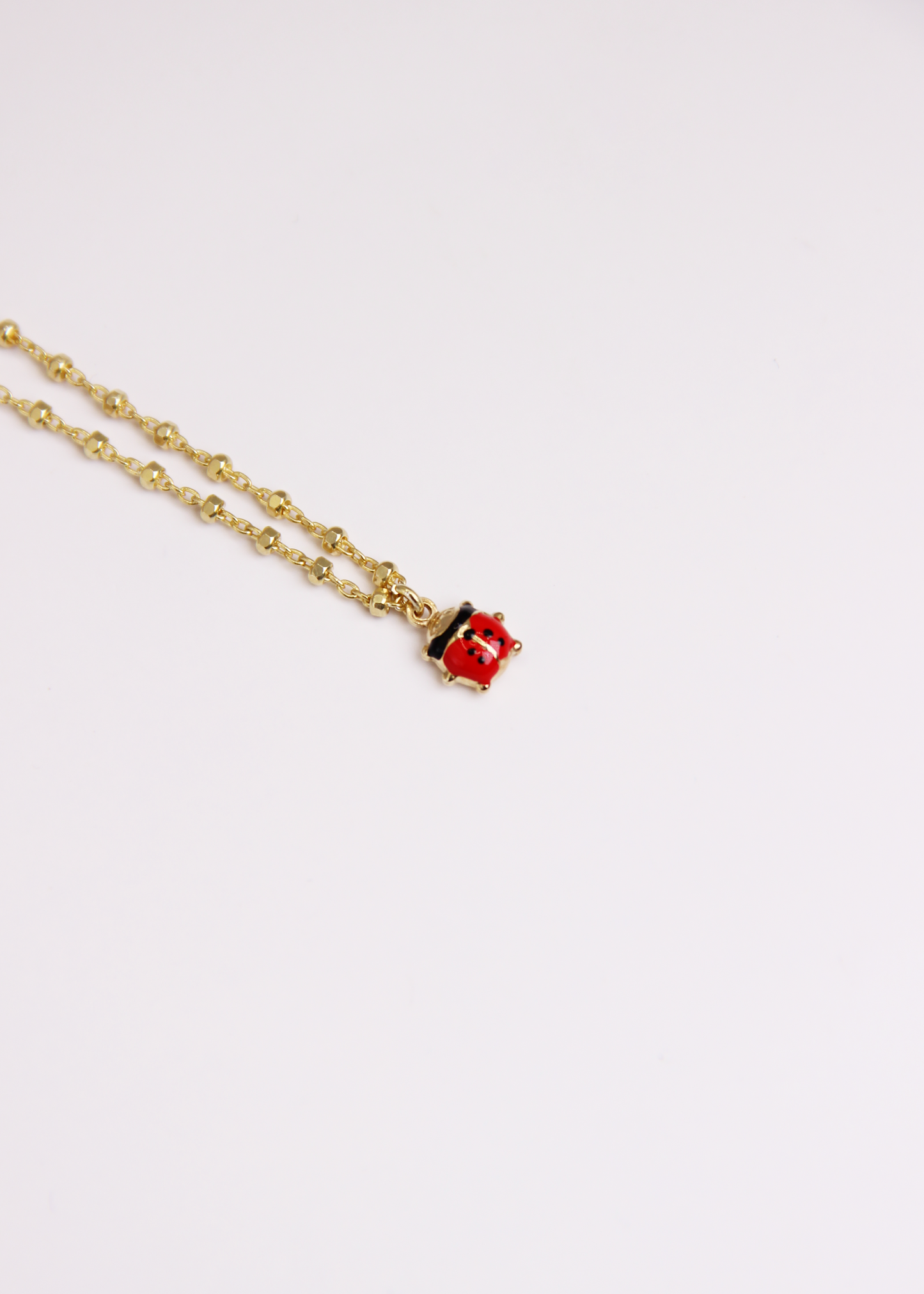 Bracciale con mini ciondolo in argento