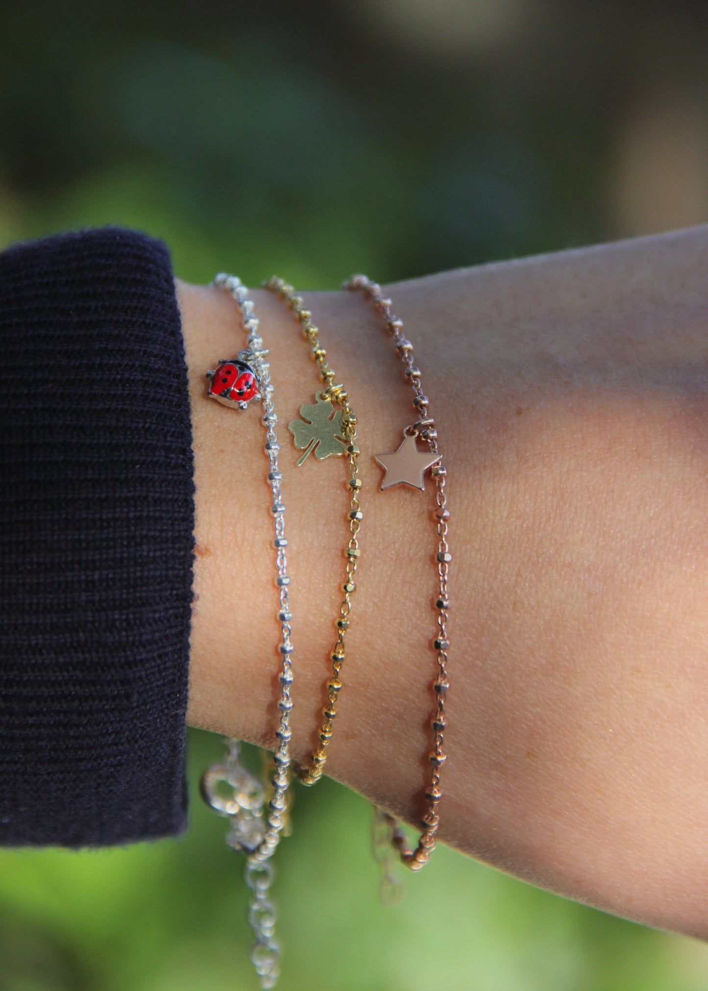 Bracciale con mini ciondolo in argento