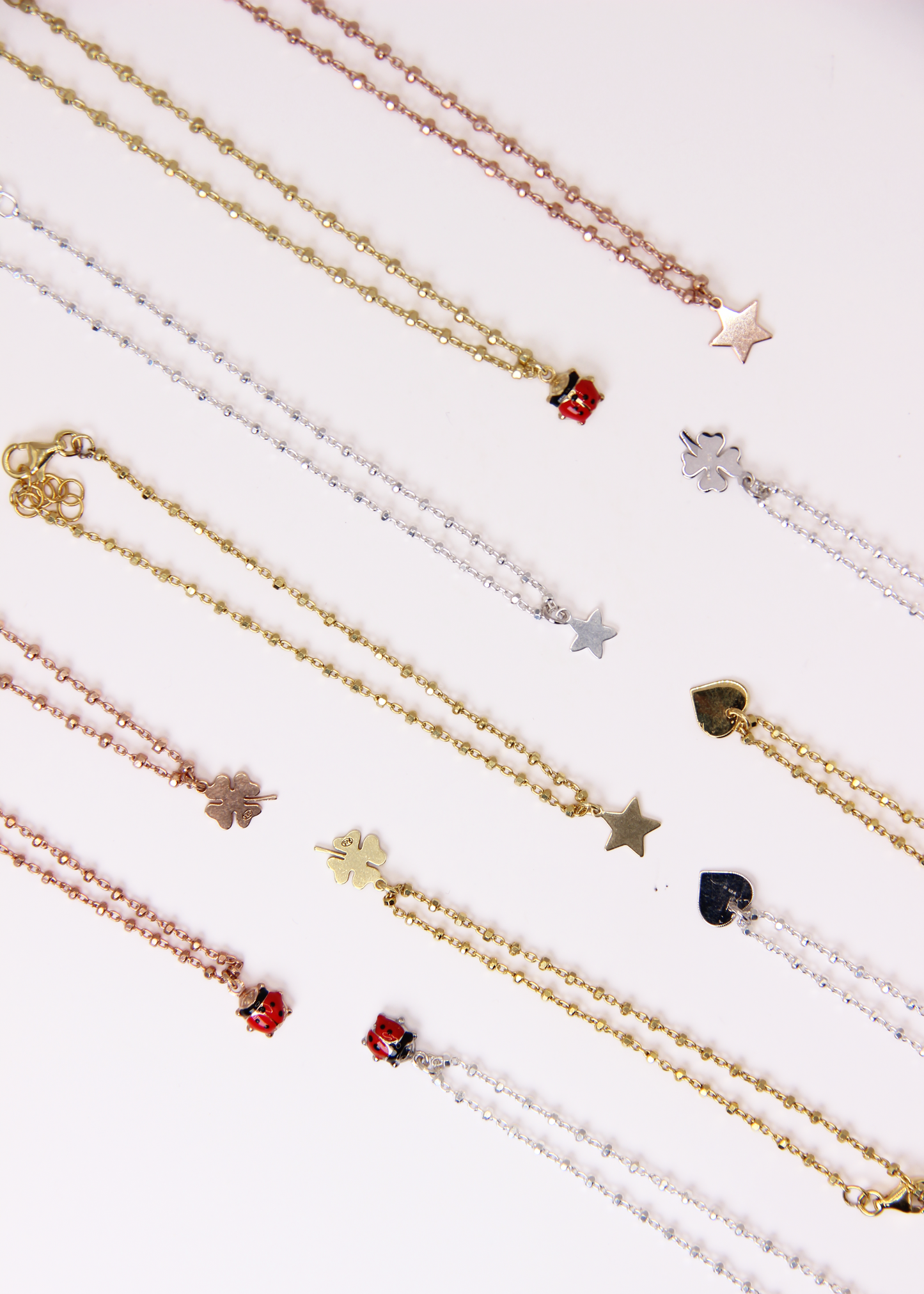 Bracciale con mini ciondolo in argento