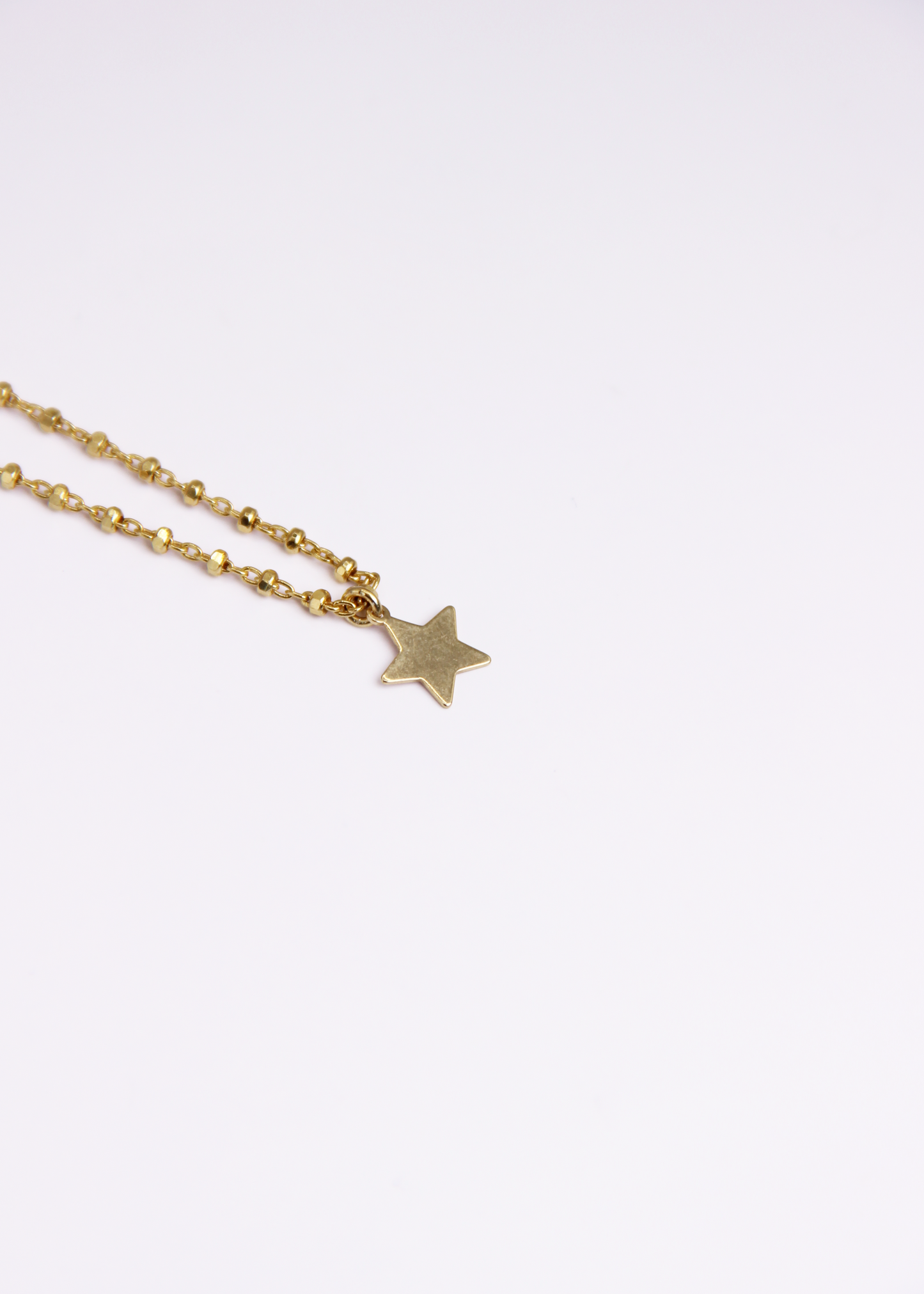 Bracciale con mini ciondolo in argento