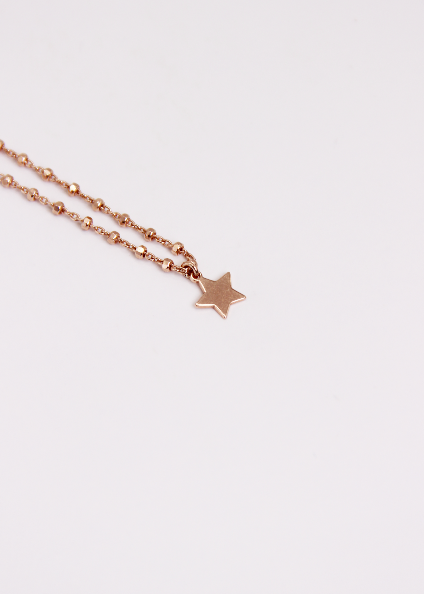 Bracciale con mini ciondolo in argento