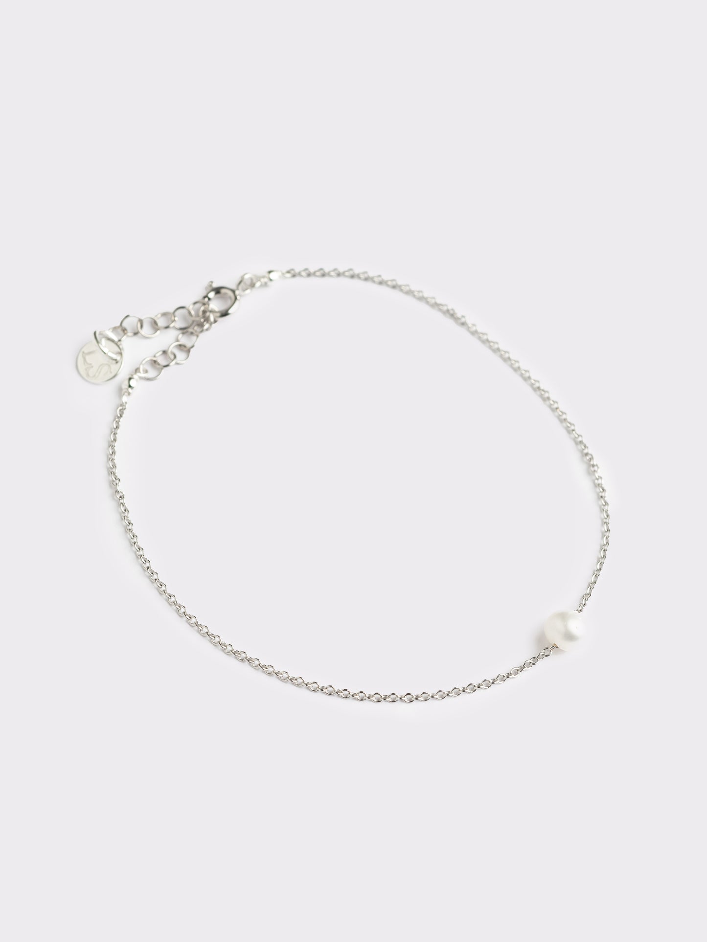 Bracciale Filo in argento con perla di lago passante