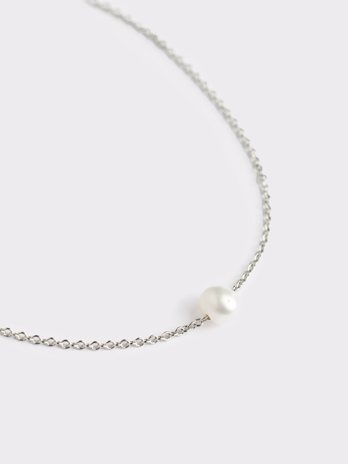 Bracciale Filo in argento con perla di lago passante