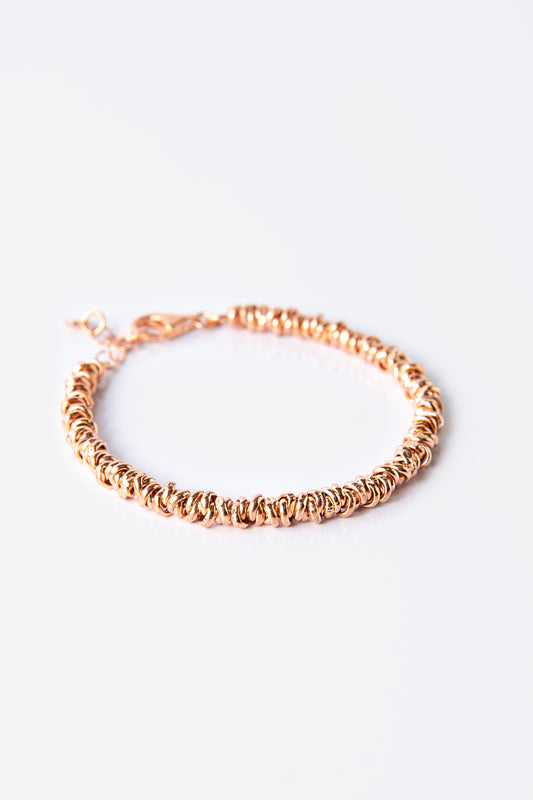 Bracciale argento rosè anellini intrecciati