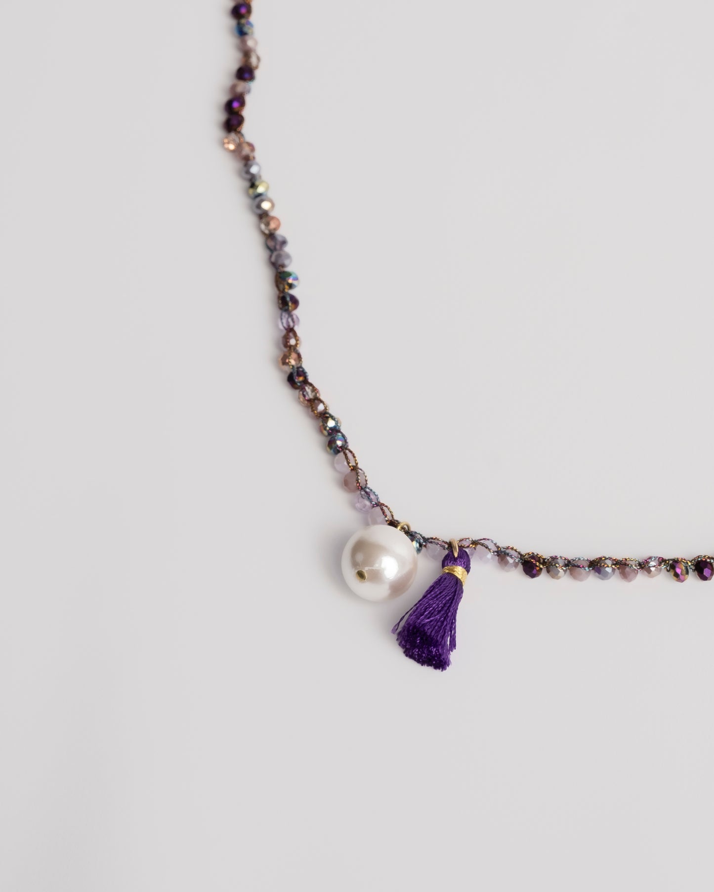 Collana uncinetto e cristalli con perla e nappina
